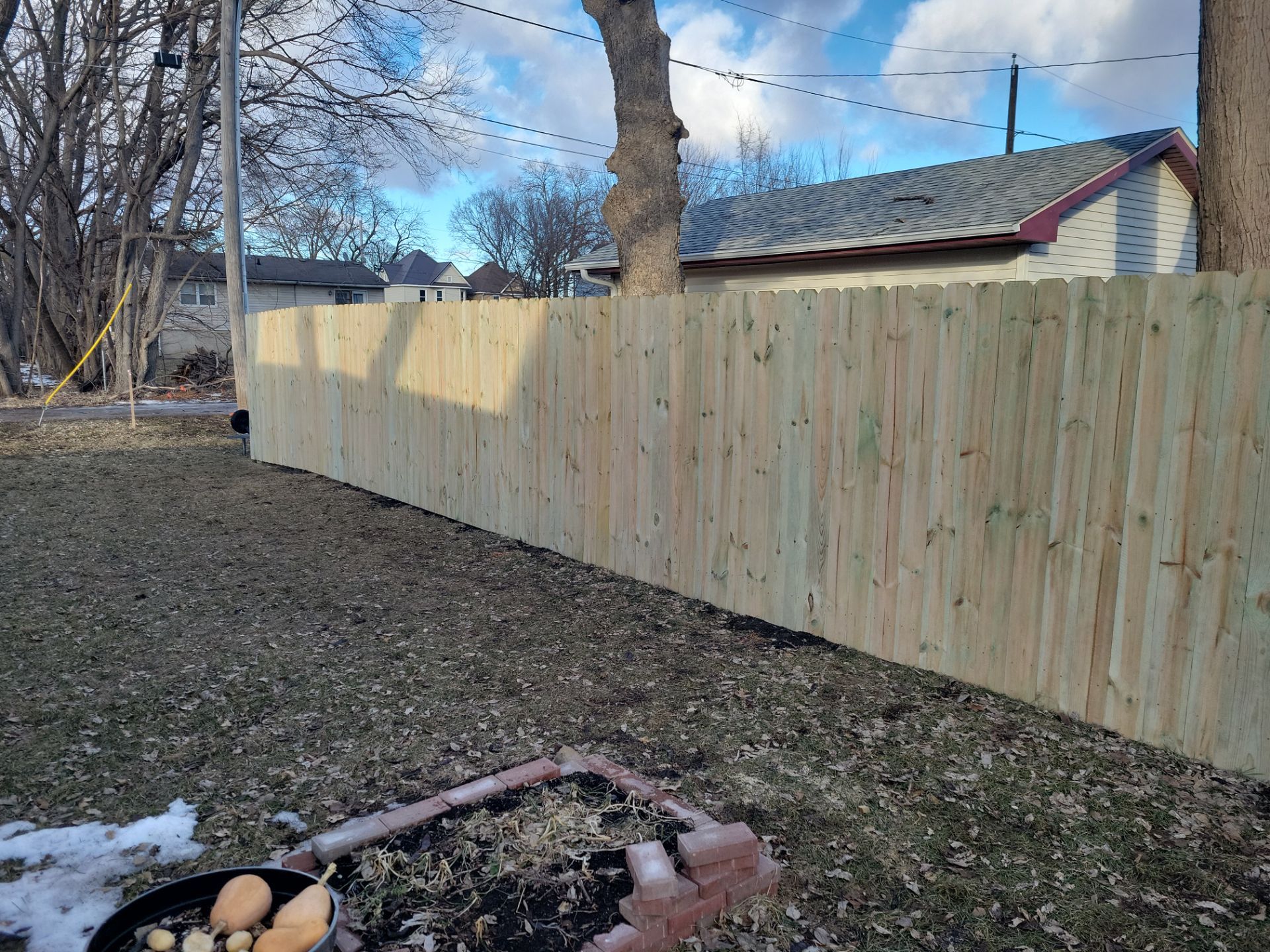 Pressure-Treated Wood Privacy Fence and Double Gate Installation in Waterloo by Perfect Picket Fence and Stain