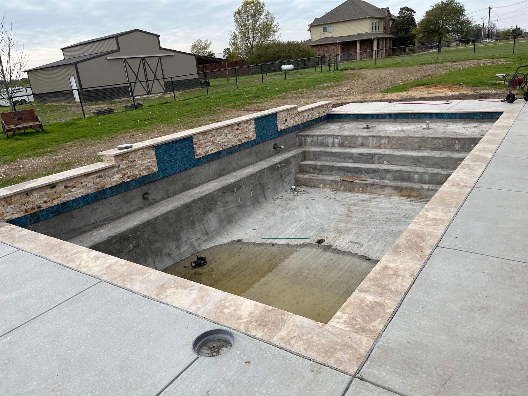 Geometric Pool with Stone Coping by Pinnacle Pools and Spas - DFW