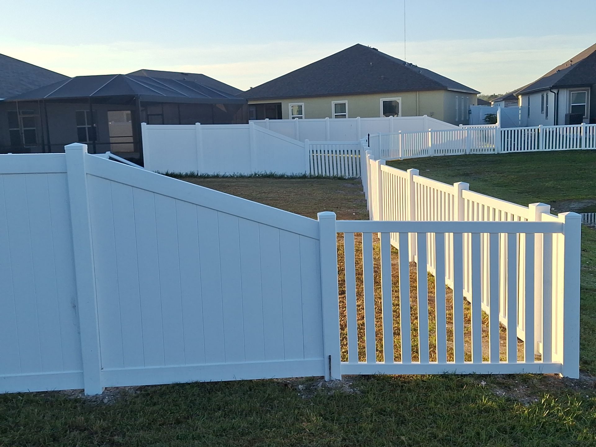 Vinyl Fence Installation using 6Ft White Vinyl Privacy Fence with a 4Ft White Clearwater Picket Fence by Asap fence and gates, LLC