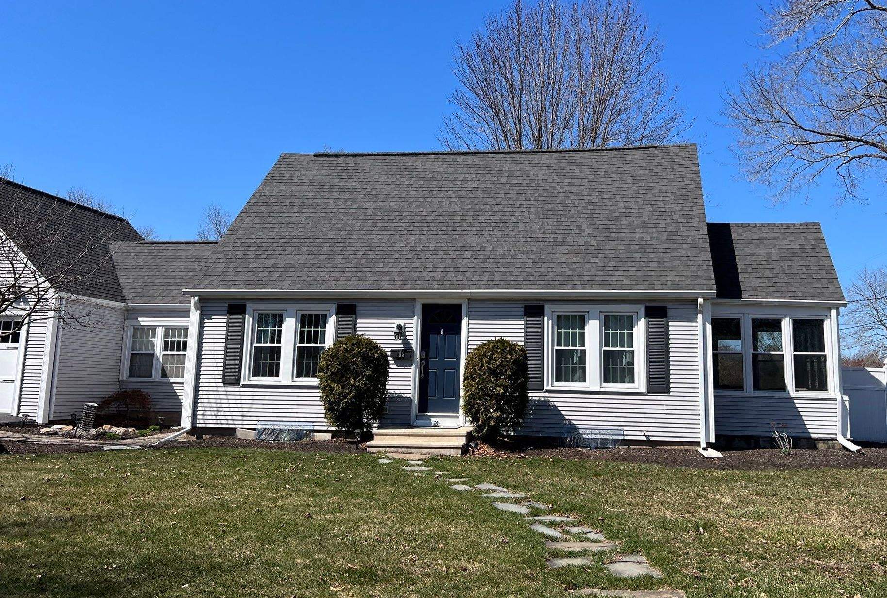 Pewterwood Roofs by Pinnacle Roofing & Skylights