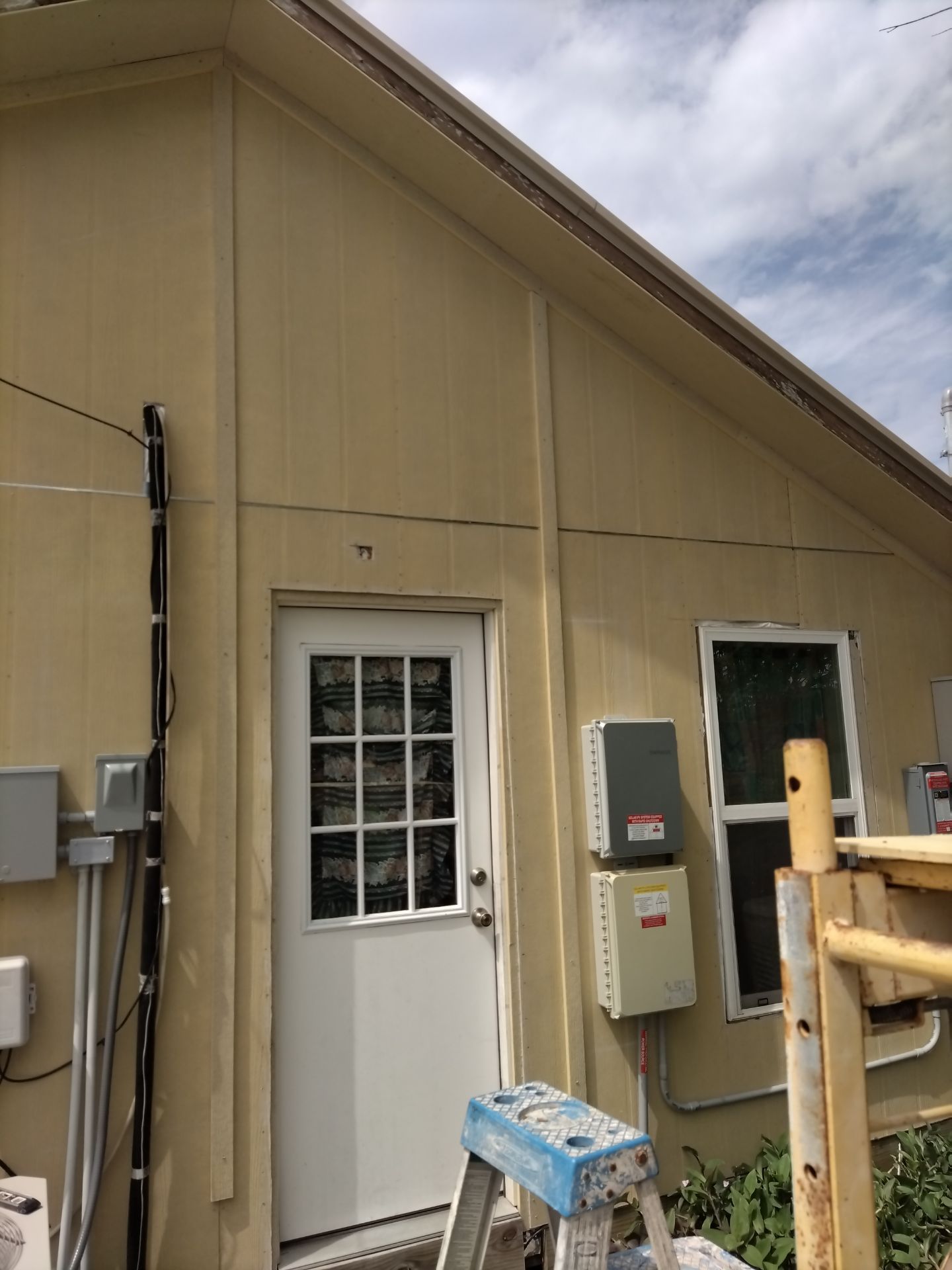 Vinyl to Hardie by Bayfront Roofing and Construction