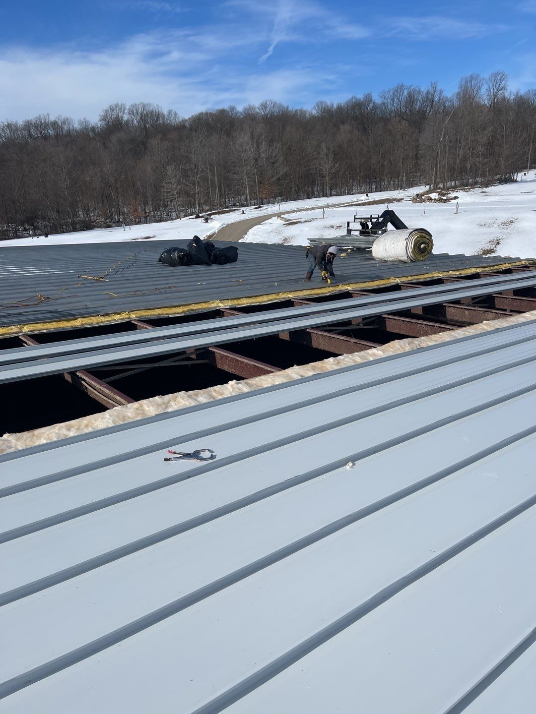 Commercial Roofing Installation using 24 Guage Double Lock Standing Seam by CentiMark Roofing