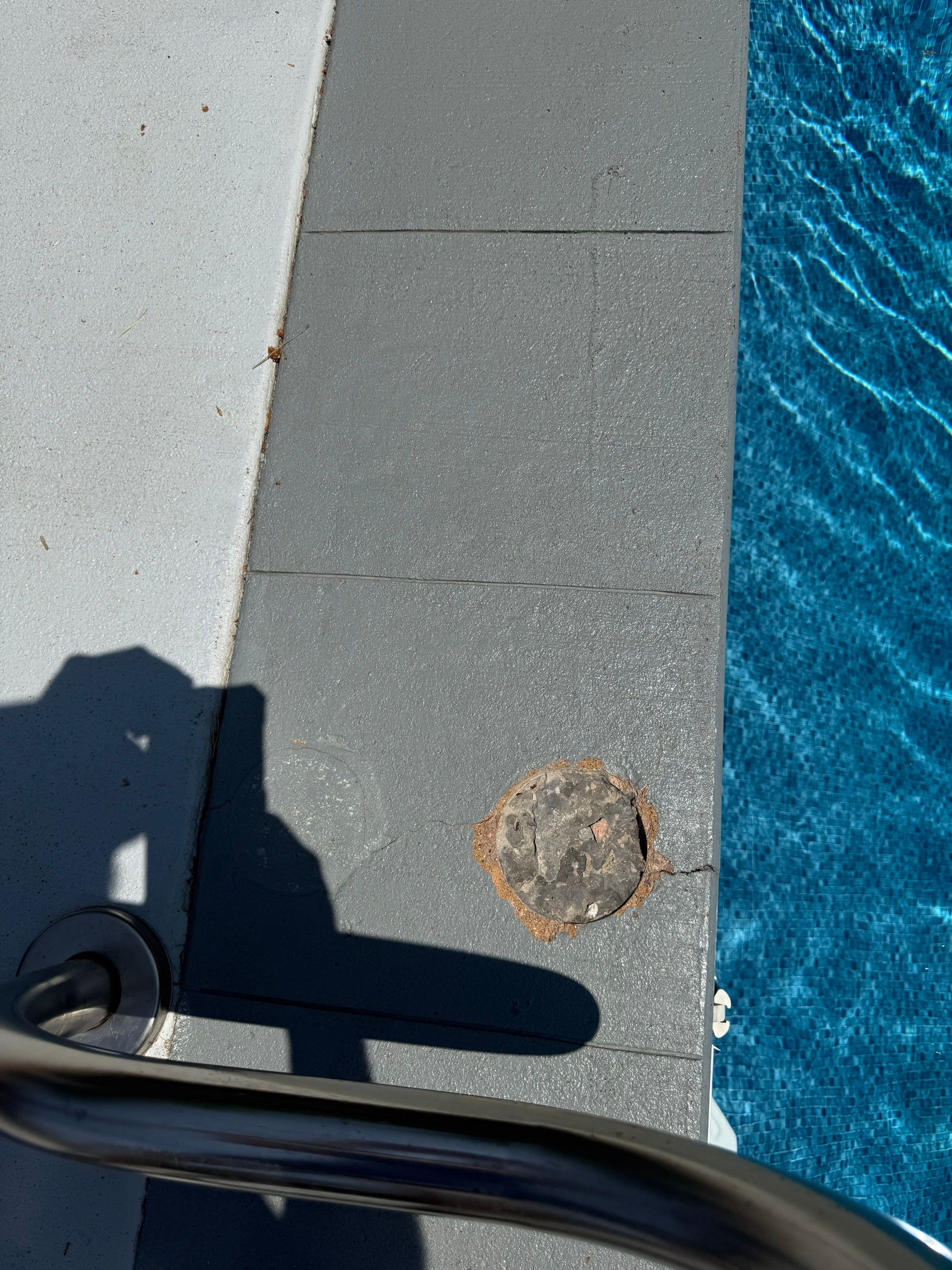 Decorative Concrete Pool Deck and Patio Resurfacing in Sioux Falls by Select Painting, Coatings & Garage Cabinets