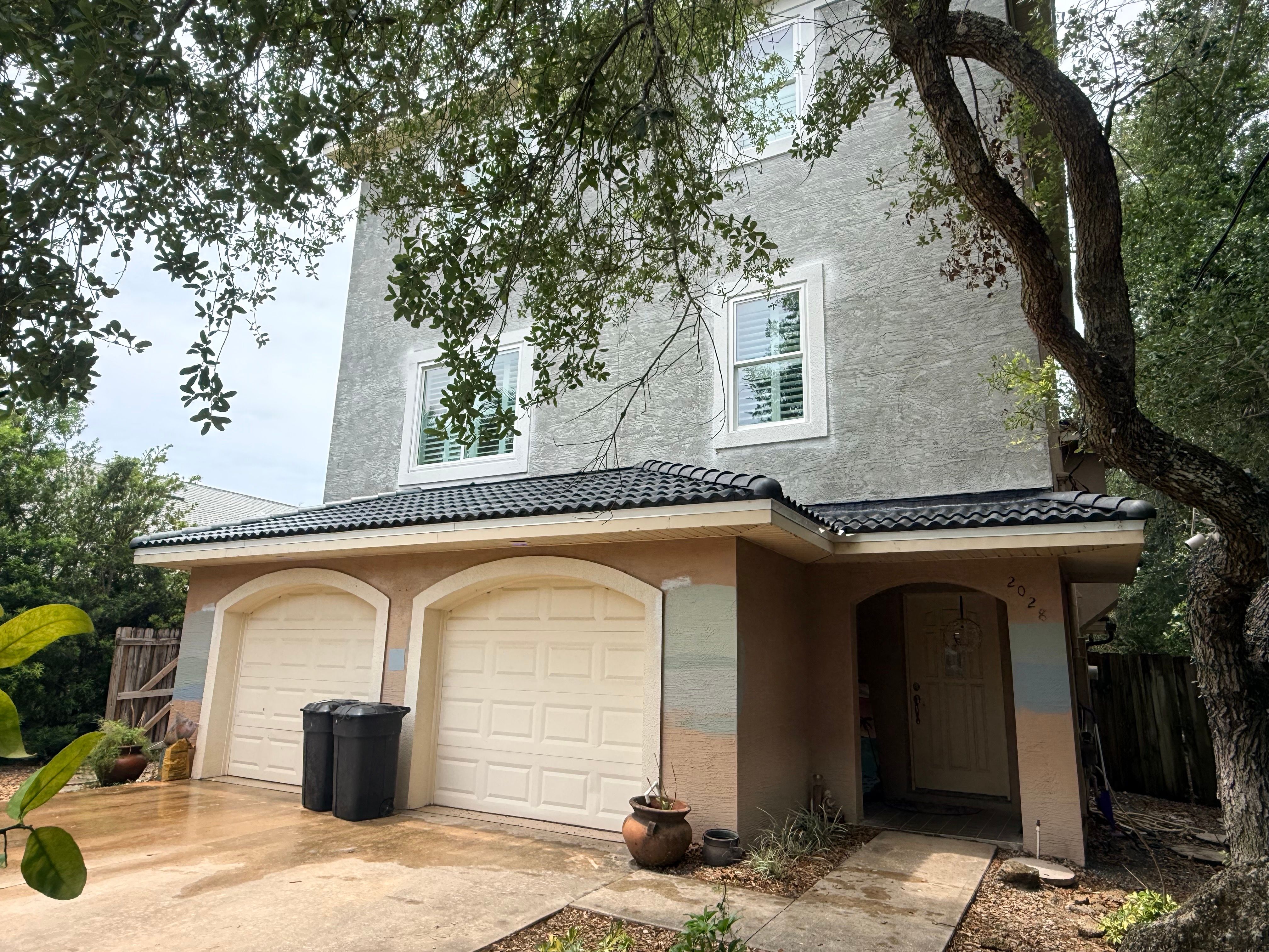 Flagler Beach Residential Tile Roof Replacement with Dark Barrel Tiles by Fortified Roofing Solutions Corp.