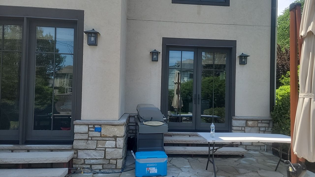 Housewashing  using Algaecide, soft wash soap by Northern Power Washing LLC.