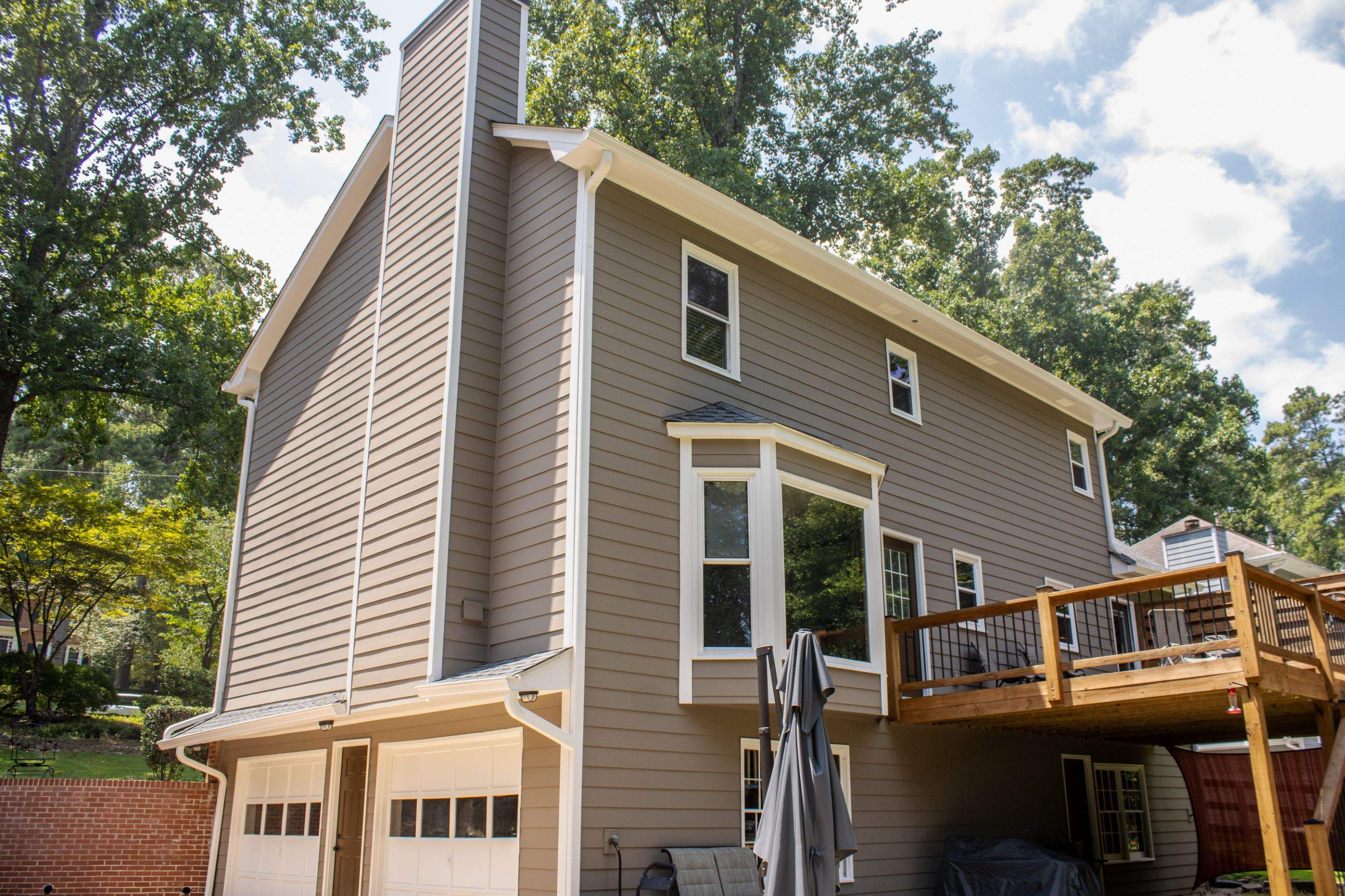 Siding Replacement and Exterior Painting using James Hardie Lap Siding and Sherwin Williams Paint by Nelson Exteriors 