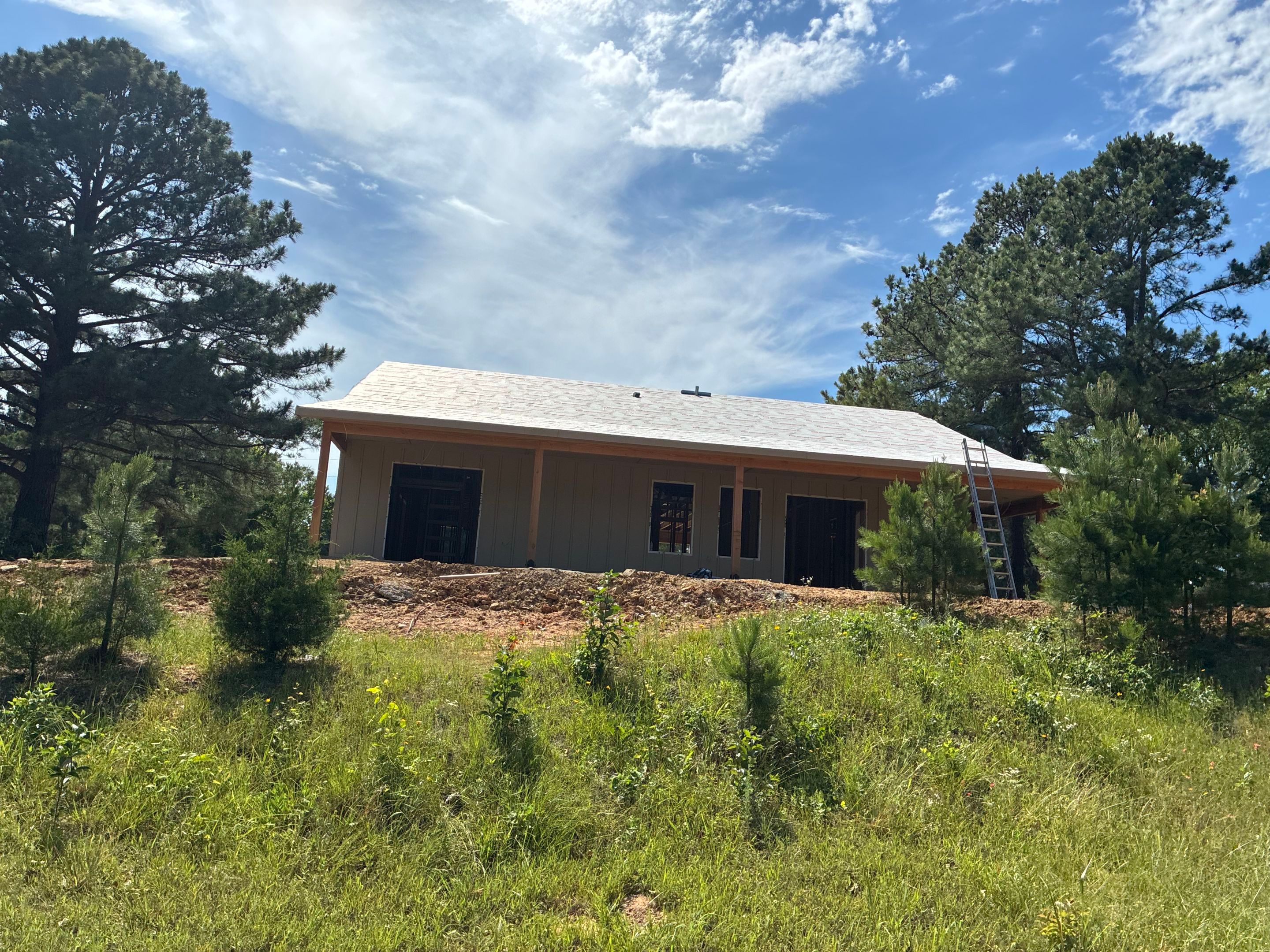 Copper Metallic 26-gauge low rib metal roofing. by In & Out Construction & Remodeling, LLC