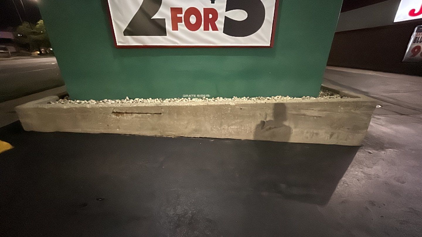 Concrete sidewalk cleaning and degreasing by Northern Power Washing LLC.