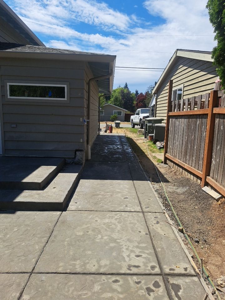 Chris | Stamped Concrete Patio, Walkway & Steps by Jireh Asphalt & Concrete Inc 