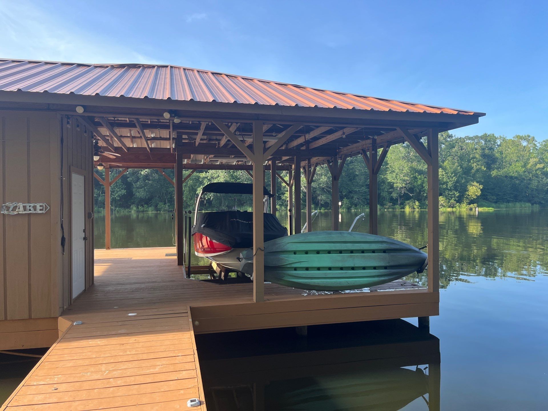 Exterior Painting in Arp, TX | Lake House & Deck Restoration by Quality Coats Painting