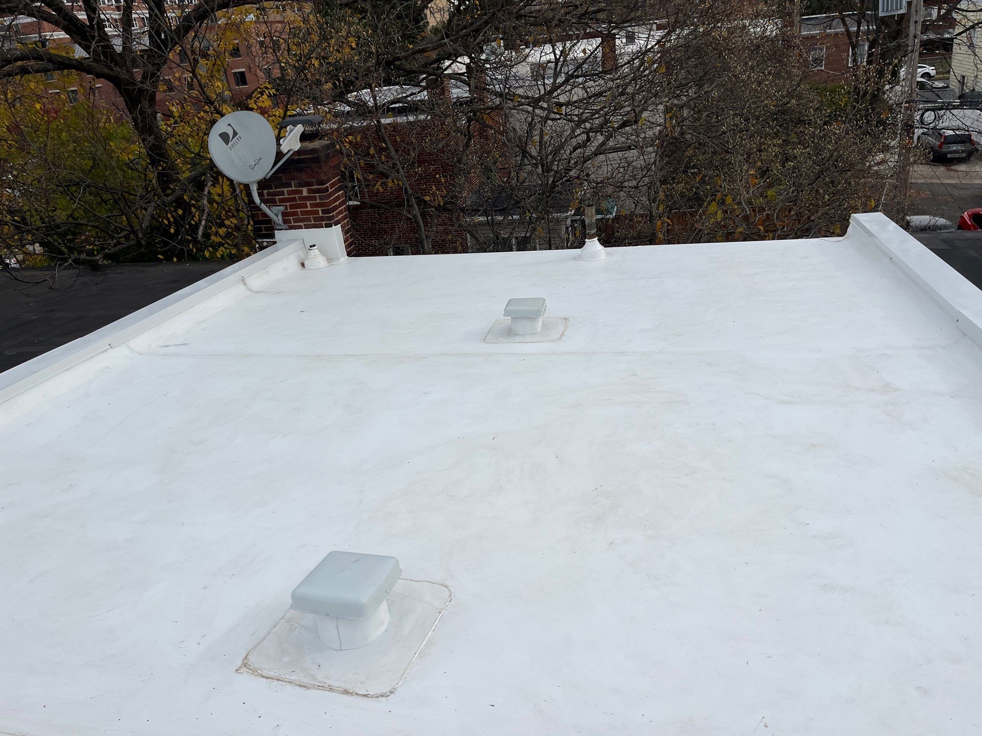 Alexandria: Residential Flat Roof Replacement with Mule Hide TPO Membrane by RM Banning, Inc.