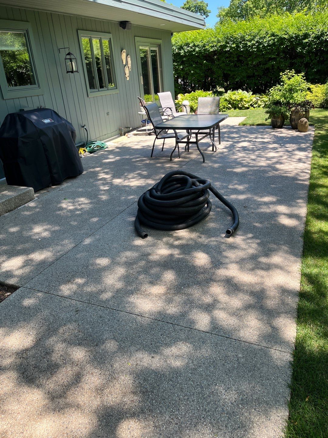 Aggregate concrete cleaning and sealing using Surebond SB-9000 by Northern Power Washing LLC.