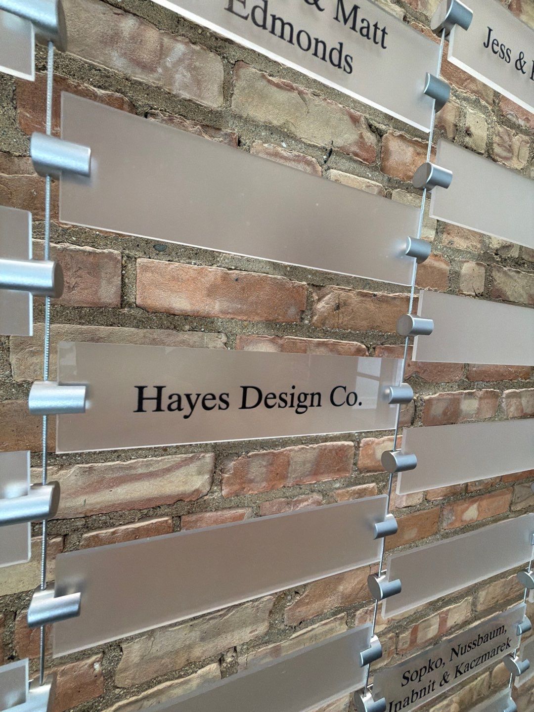 Custom Donor Recognition Walls and Wayfinding for Cultural Arts Center by Hayes Design co