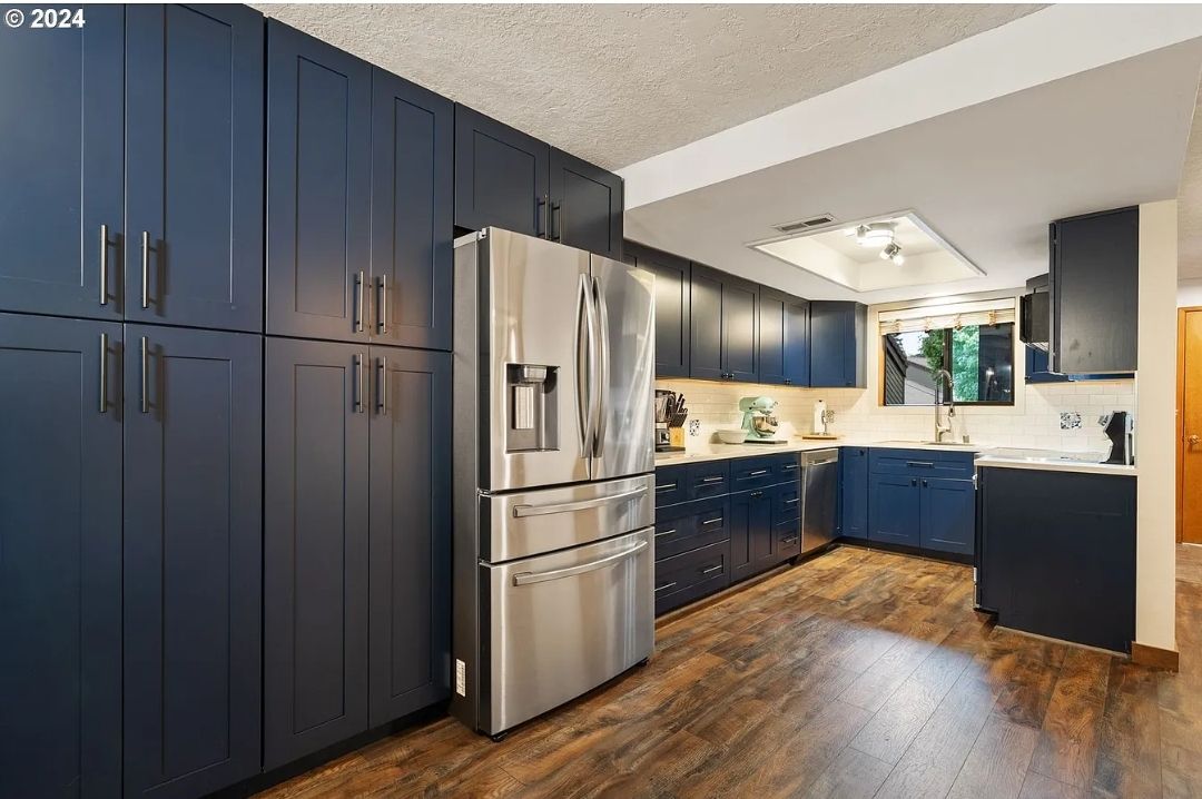 outdated Kitchen to a modern and simplistic kitchen area by Crm Services Llc