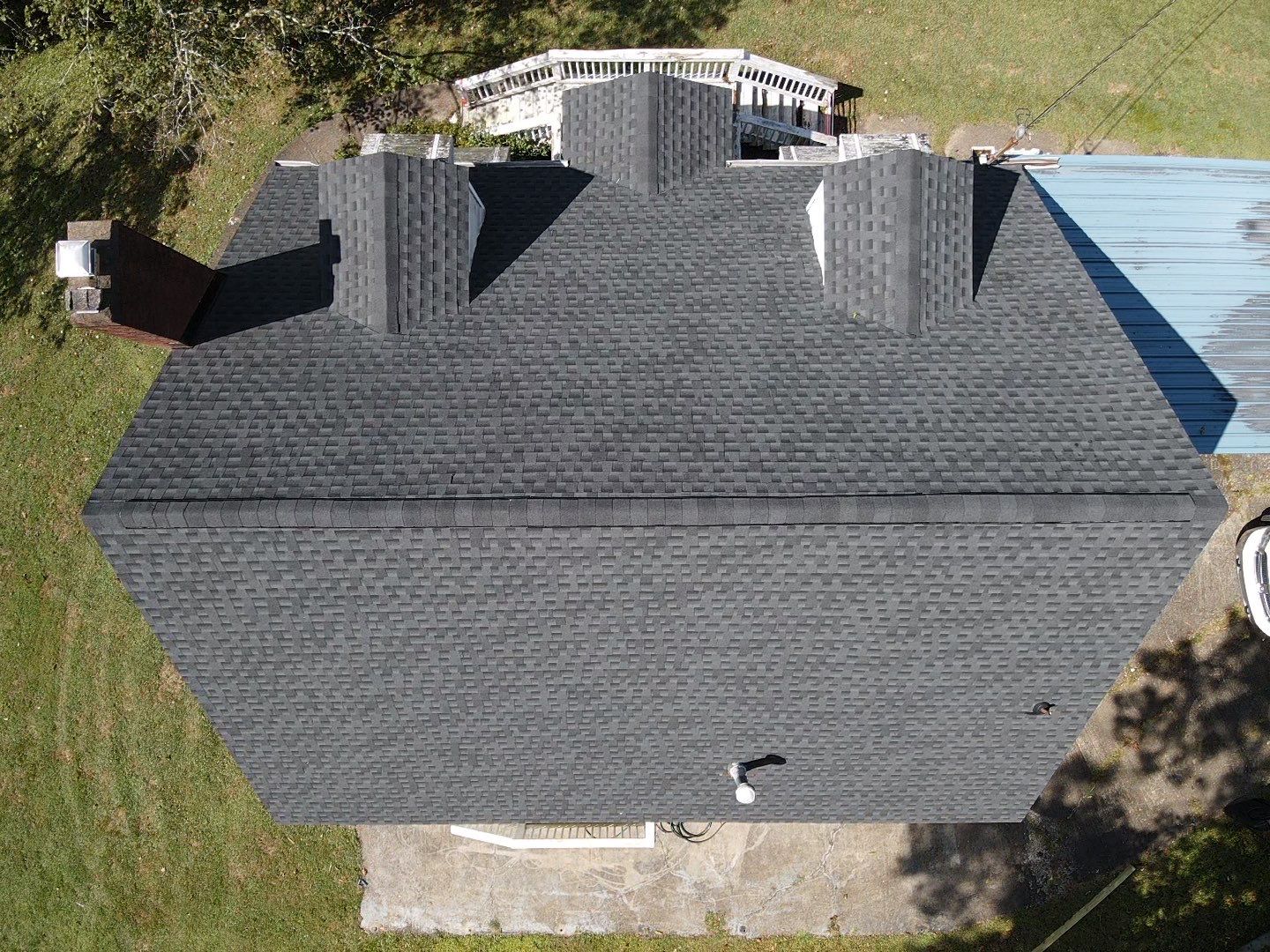 Residential Roofing Installation using GAF Timberline HDZ Charcoal by Rainstoppers Roofing
