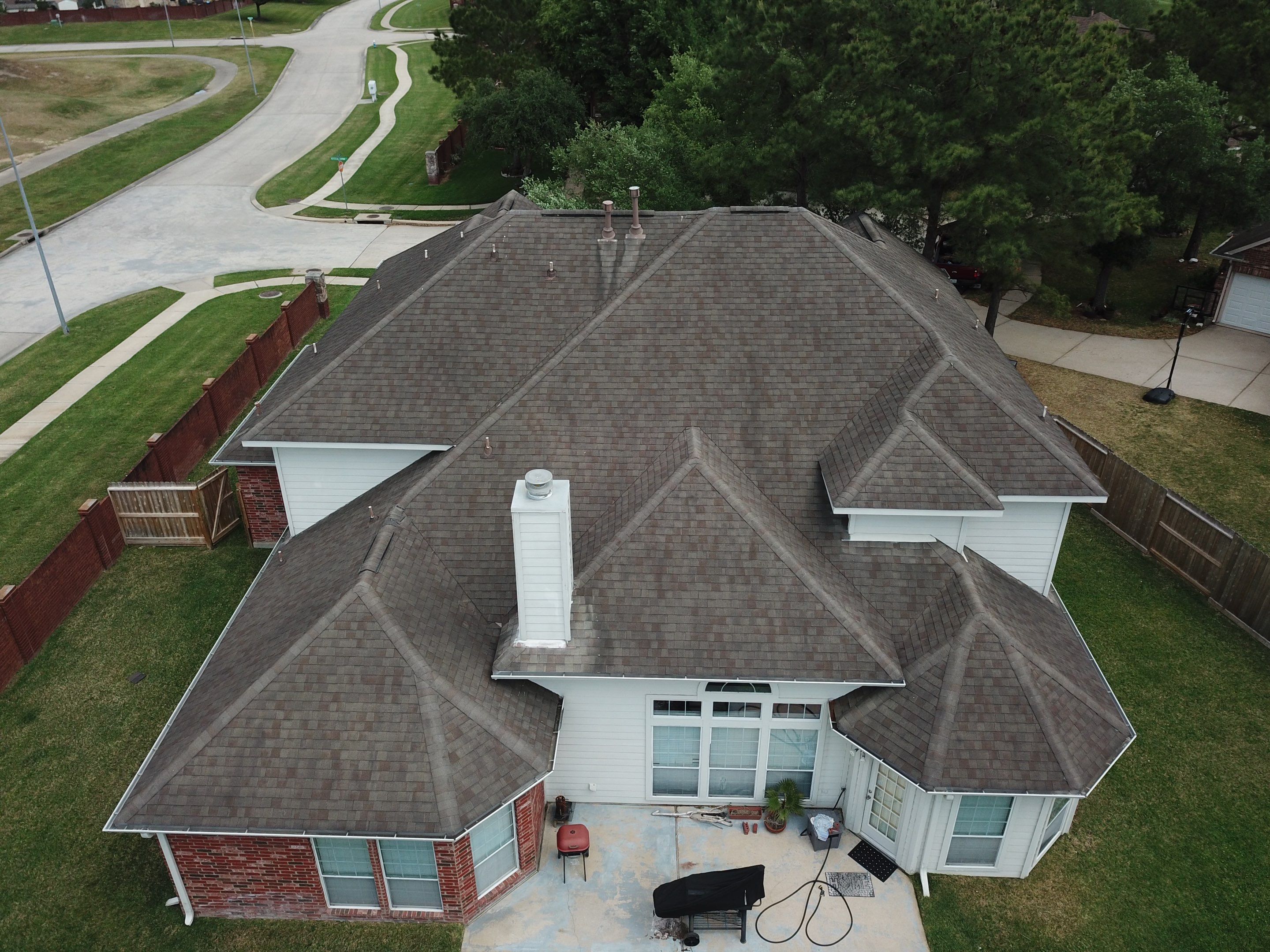 OC Duration Driftwood by HHH Roofing & Construction