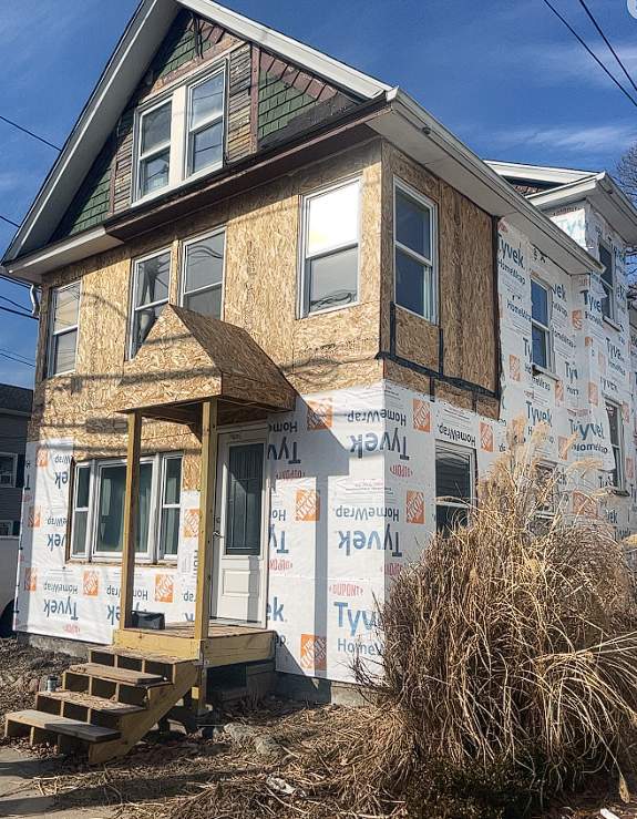 Siding Installation using Hardie Plank Aged Pewter by A Plus Exterior
