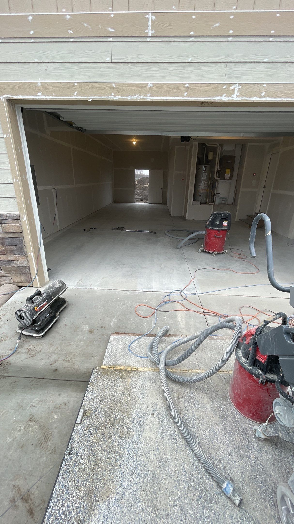 Garage Transformation using Domino by Croc Coatings, LLC