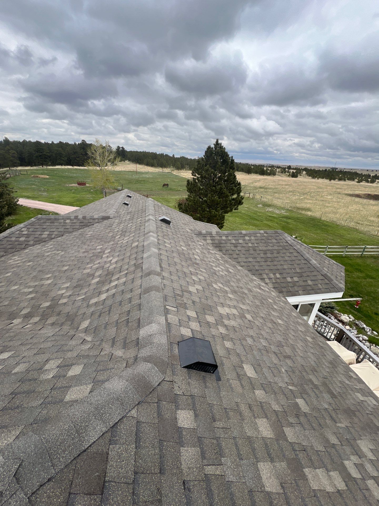 Residential Roofing Installation using Atlas Pinnacle Impact Weathered Wood by Blue Peaks Roofing LLC 