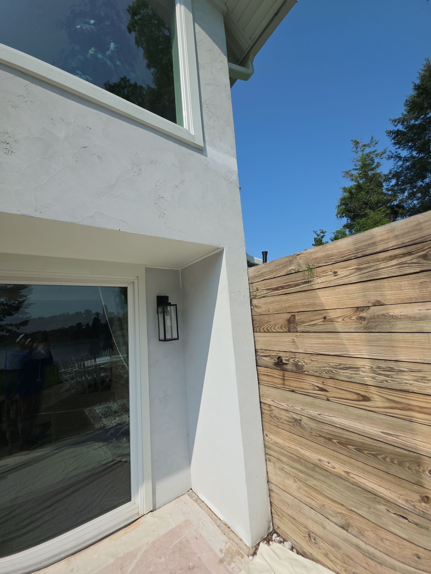 Norton Shores Residential Stucco Repair and Exterior Painting Refresh by Gordon Painting