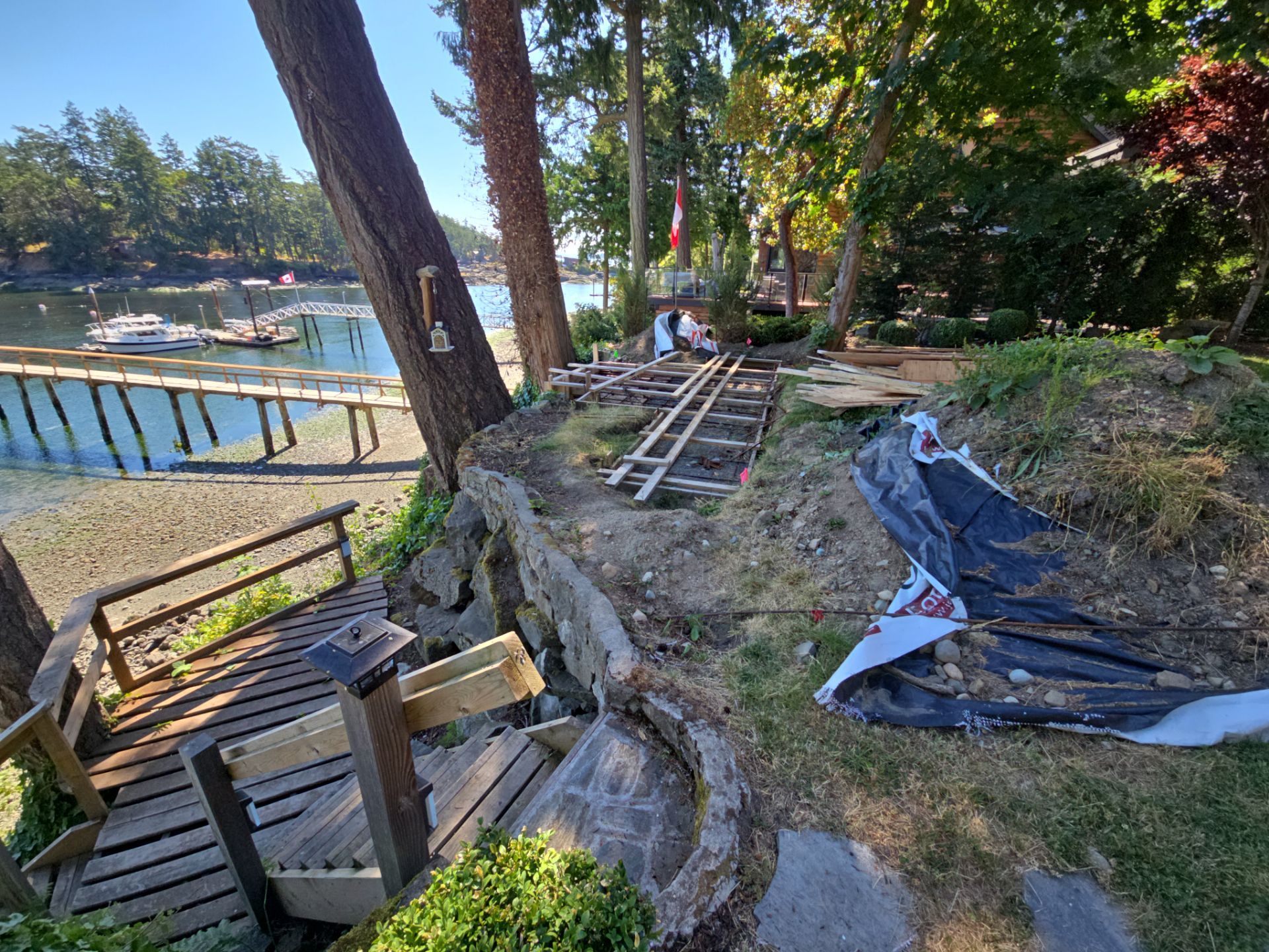 Coastal Landscape Restoration & Retaining Structure - In progress by Habanero Garden and Exterior Care