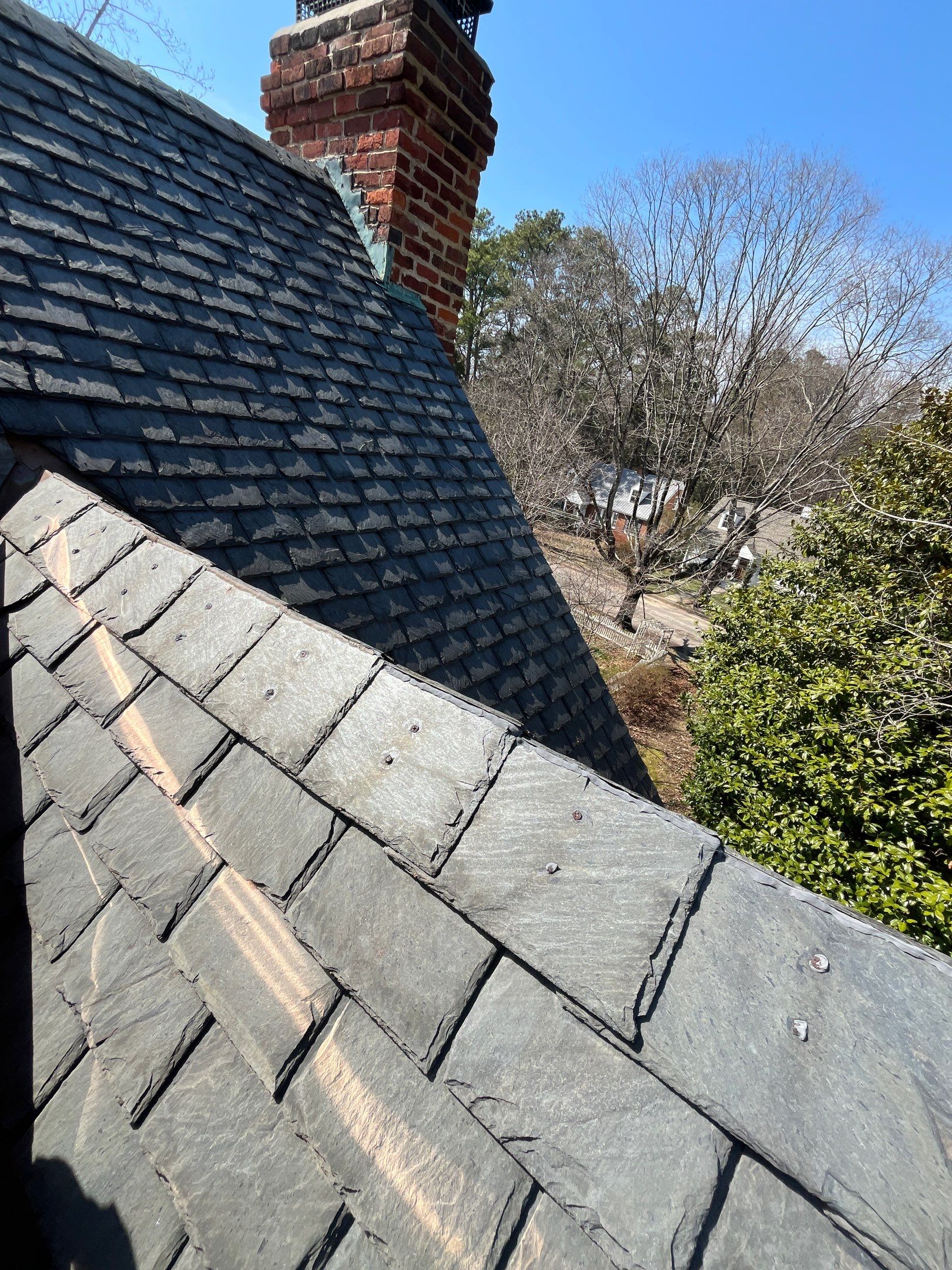 Slate Roof Restoration and Copper Ridge Cap Install in Richmond by Cade Construction