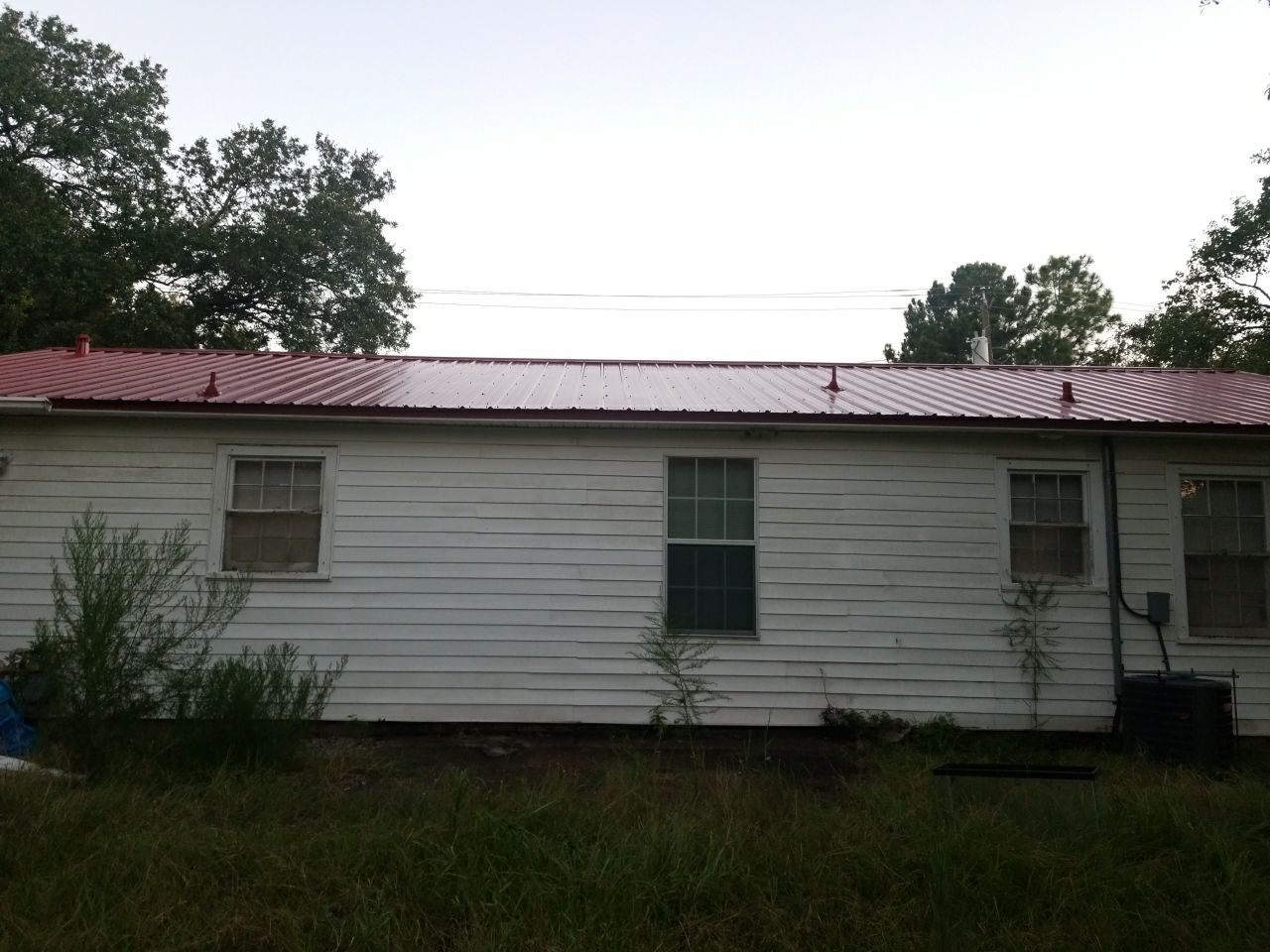 Residential Roofing Installation using Metal roofing by American Roofing & Construction LLC