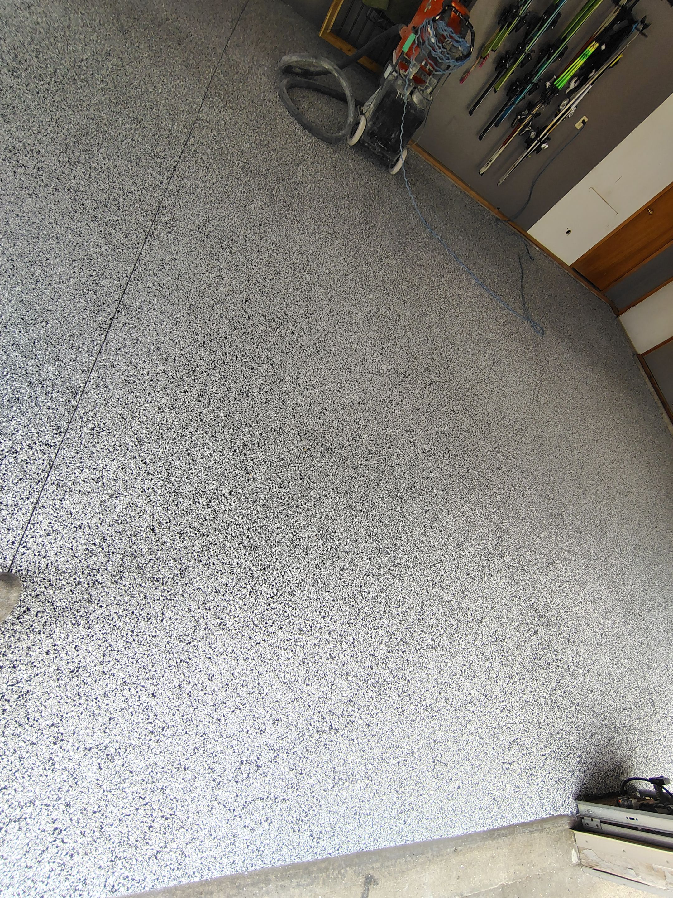 Garage Floor Concrete Coating and Crack Repair in Sioux Falls by Select Painting, Coatings & Garage Cabinets