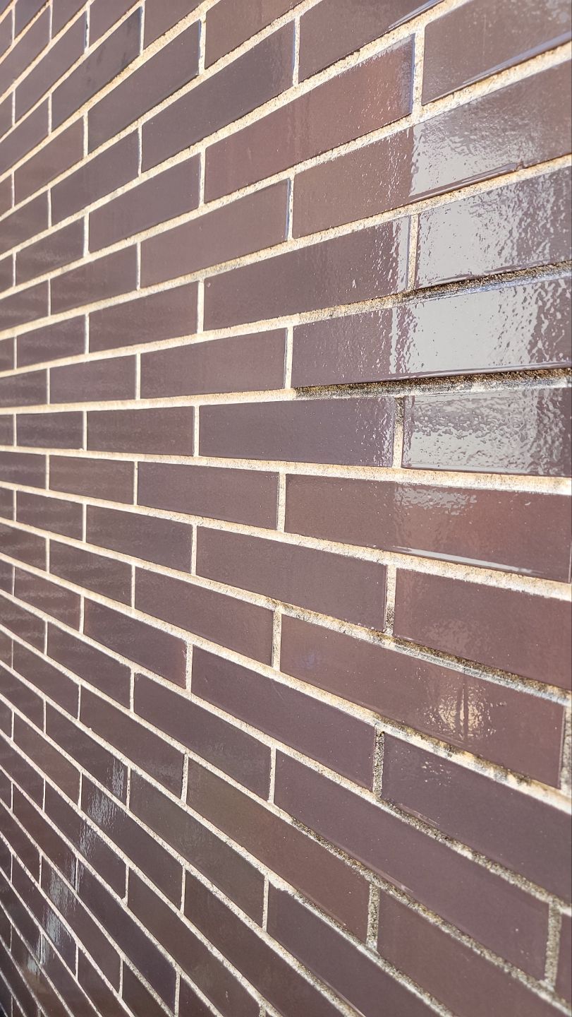 commercial pressure washing using Algaecide, soft wash soap by Northern Power Washing LLC.