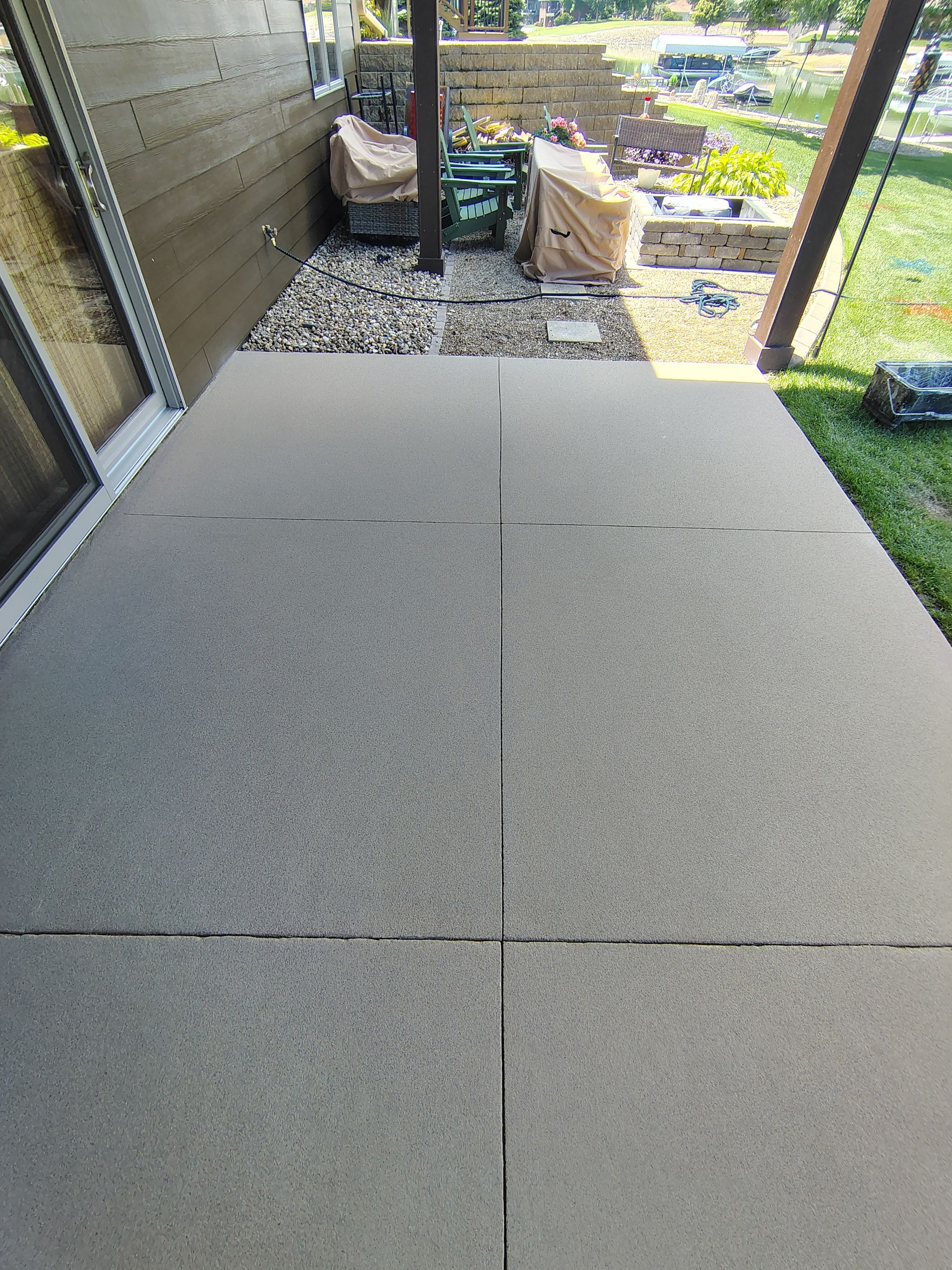 Textured Concrete Coating and Entryway Restoration in Madison by Select Painting, Coatings & Garage Cabinets