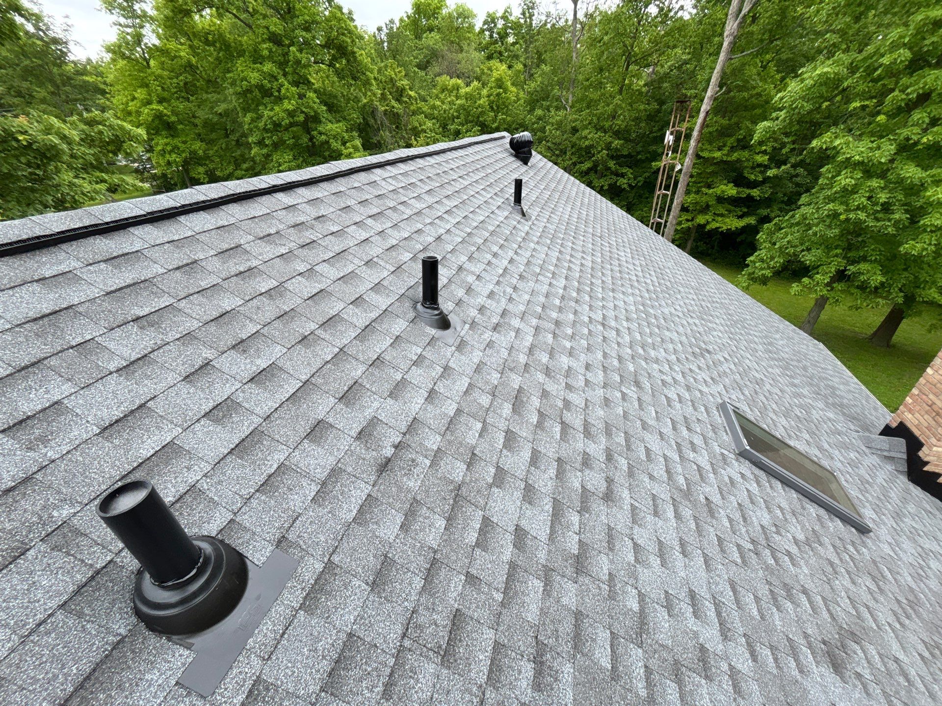 Residential Roofing Installation using GAF HDZ Pewter Gray by Nitro Roofing and Construction