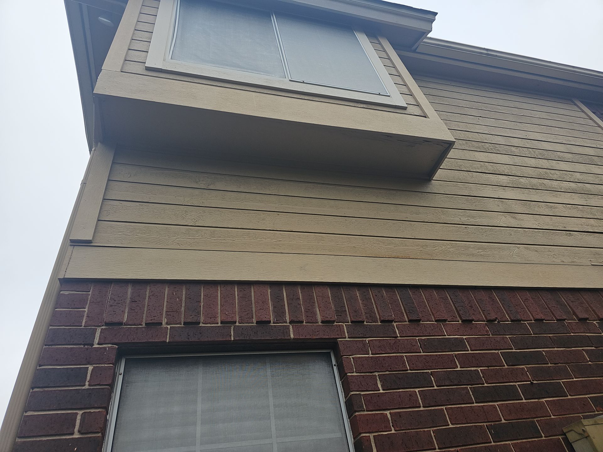 New Hardie Lap Siding & Board and Batten by DeZign Roofing & Exteriors