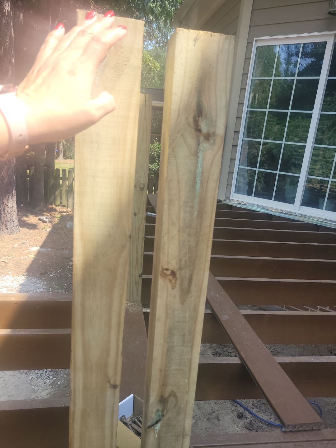 Fuquay-Varina Outdoor Upgrade – Composite Deck & Paved Landing by Elite Remodeling and Design LLC