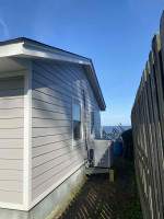 Siding Installation using JH Select Cedarmill Eased Edge by ExteriorPros