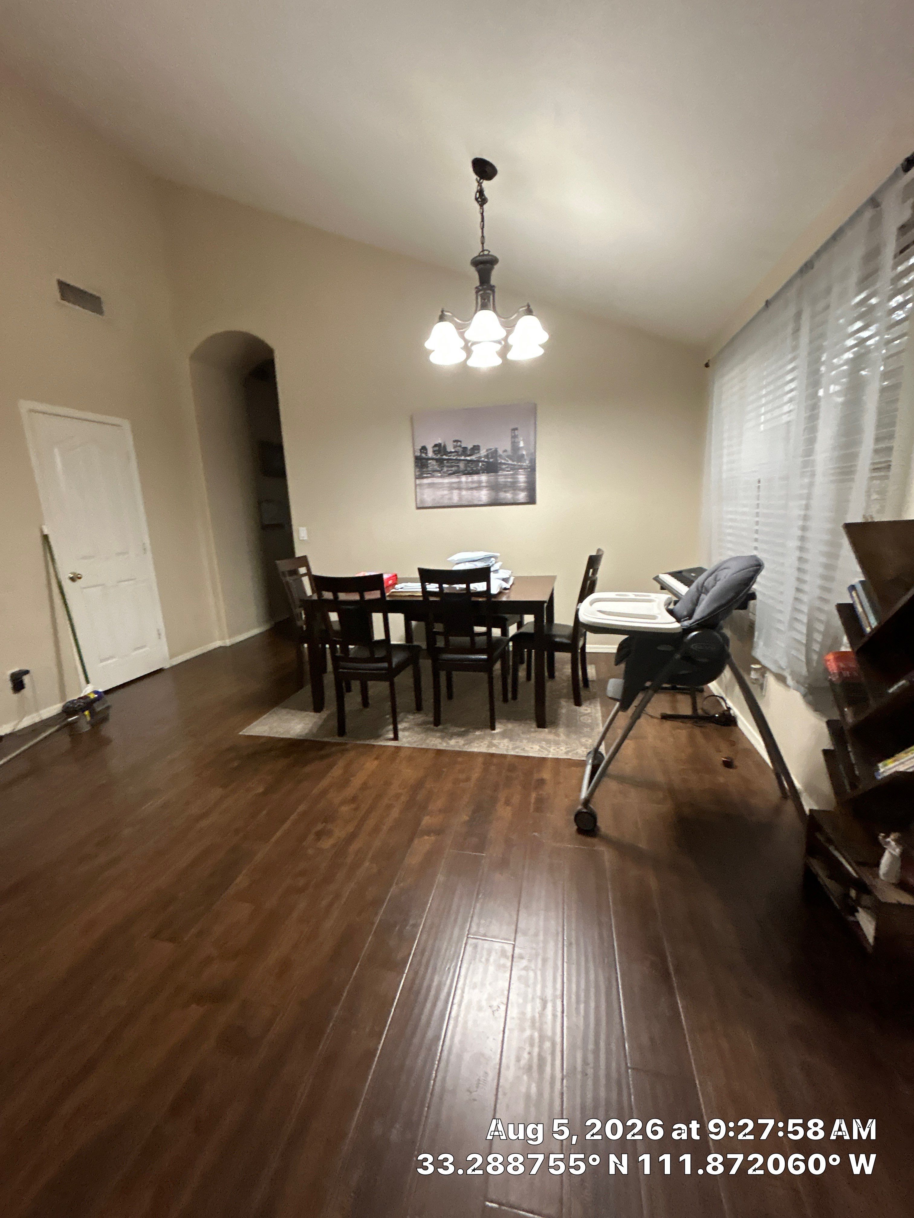 Modern Dining Room Renovation With Dark Wood Flooring in Chandler by CompanyCam Sales Demo