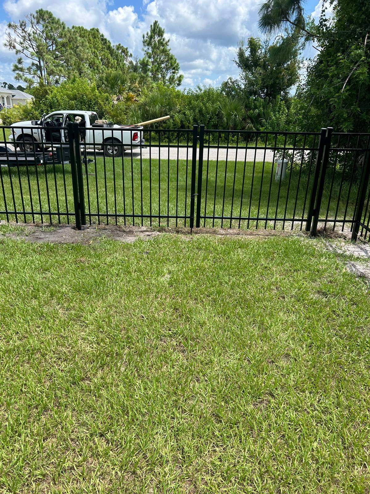 Black Aluminum Picket Fence Installation for Port Charlotte Residence by True Fence LLC