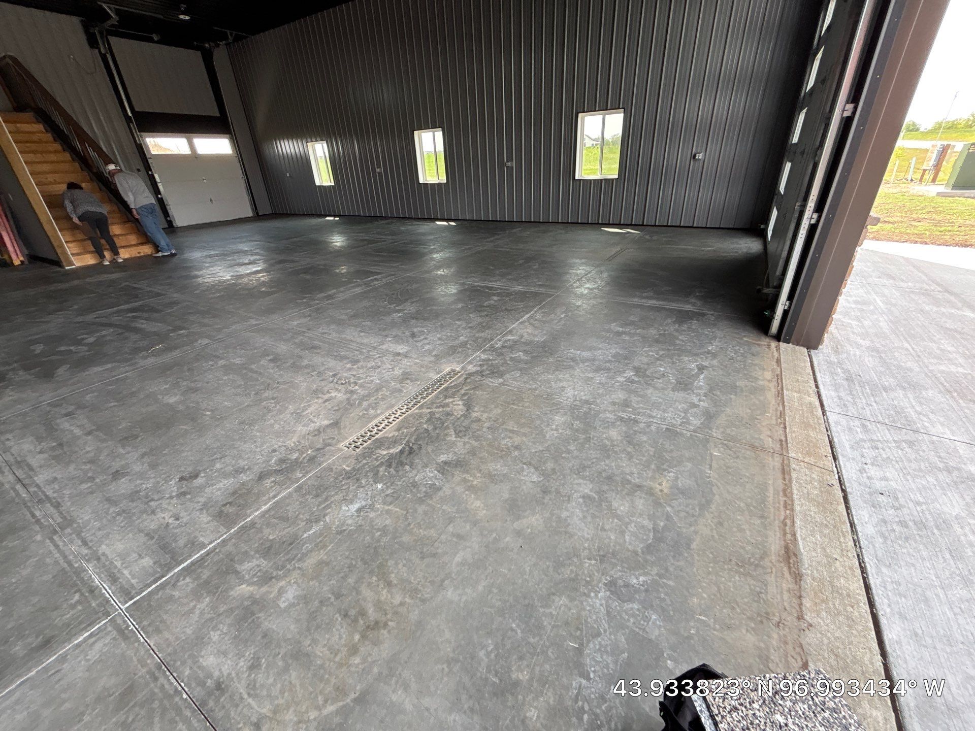 Polyaspartic Garage Floor Coating with Decorative Flake in Wentworth by Select Painting, Coatings & Garage Cabinets