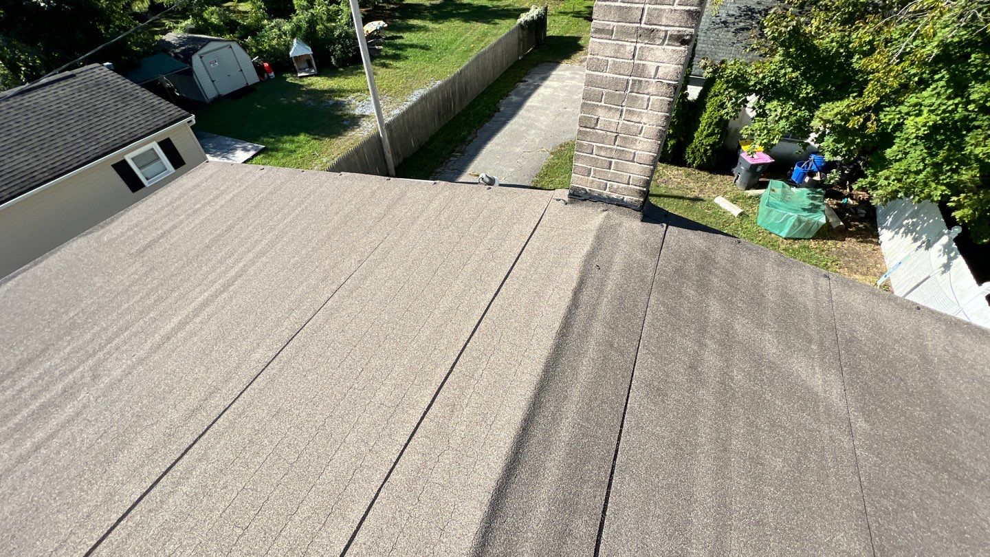 Onyx Black Shingles by Reimagine Roofing