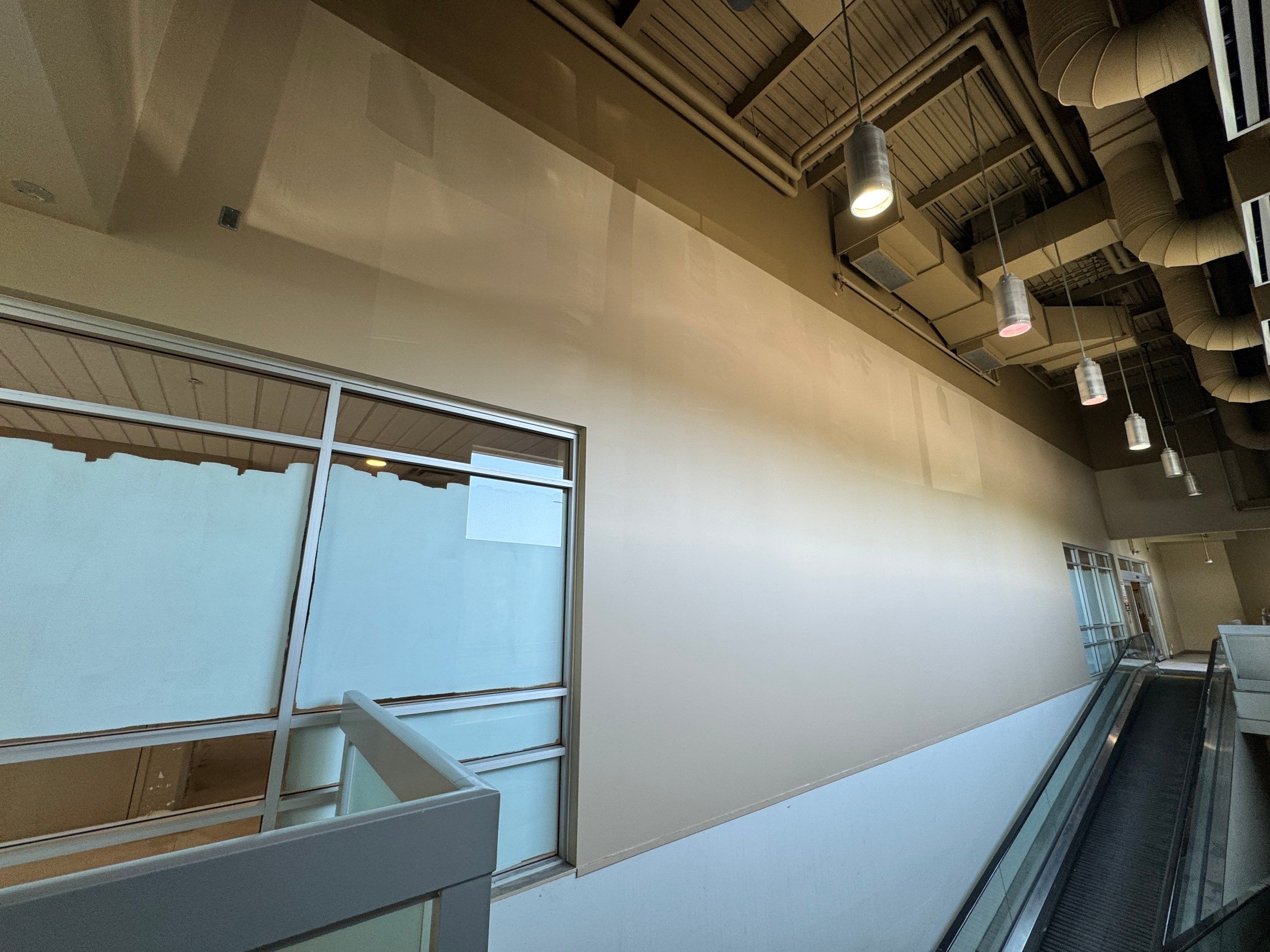 Commercial Prime & Paint Project-30ft height by YVR Construction Group