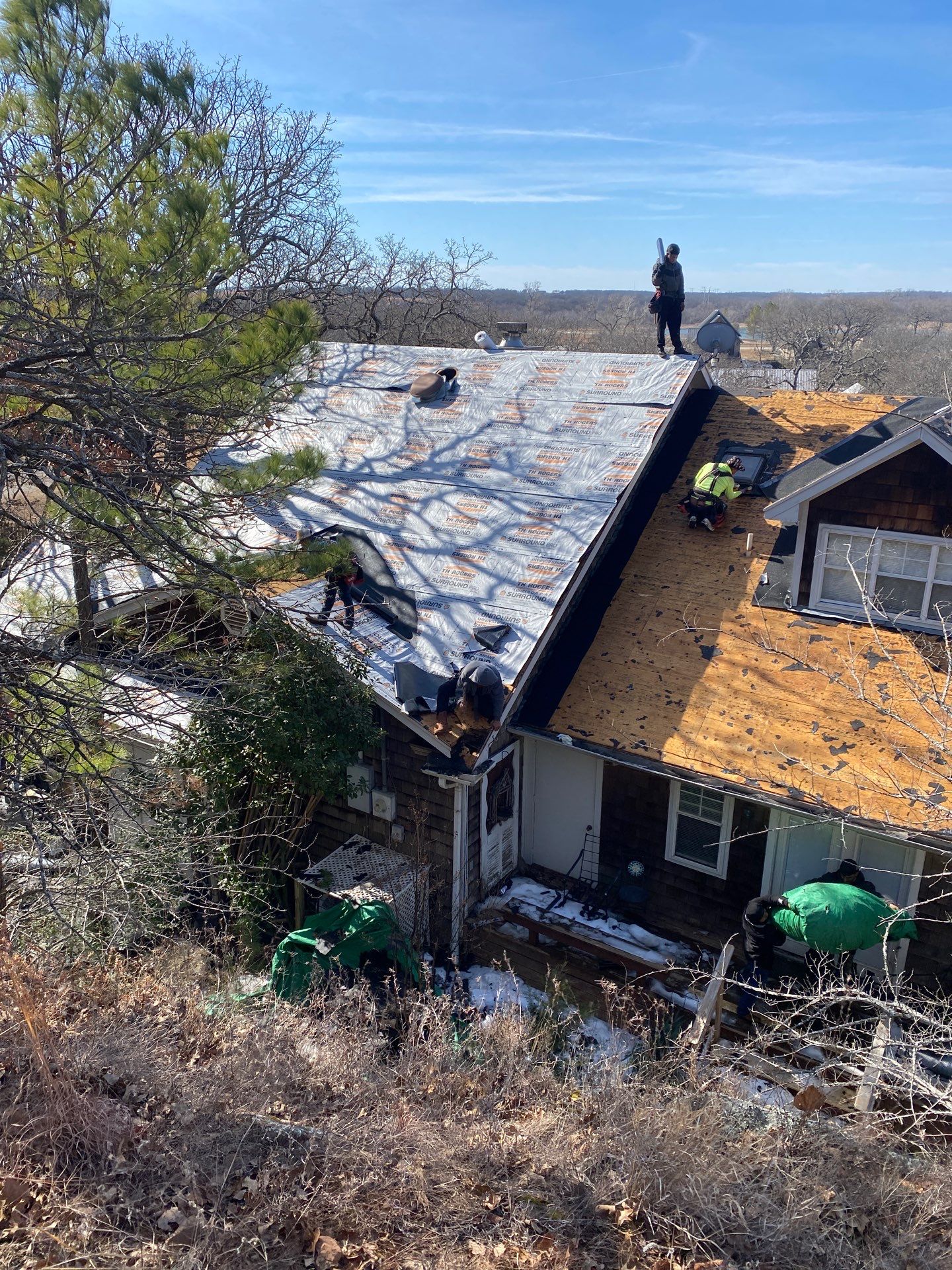 Roof Replacement on a private lake near Ardmore by BANA Roofing and Solar Supply