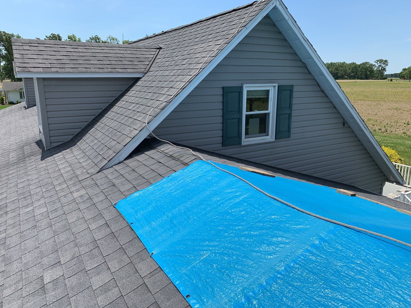 Residential Roofing Installation using Exposed Fastener Metal Roof by 4Ever Metal Roofing
