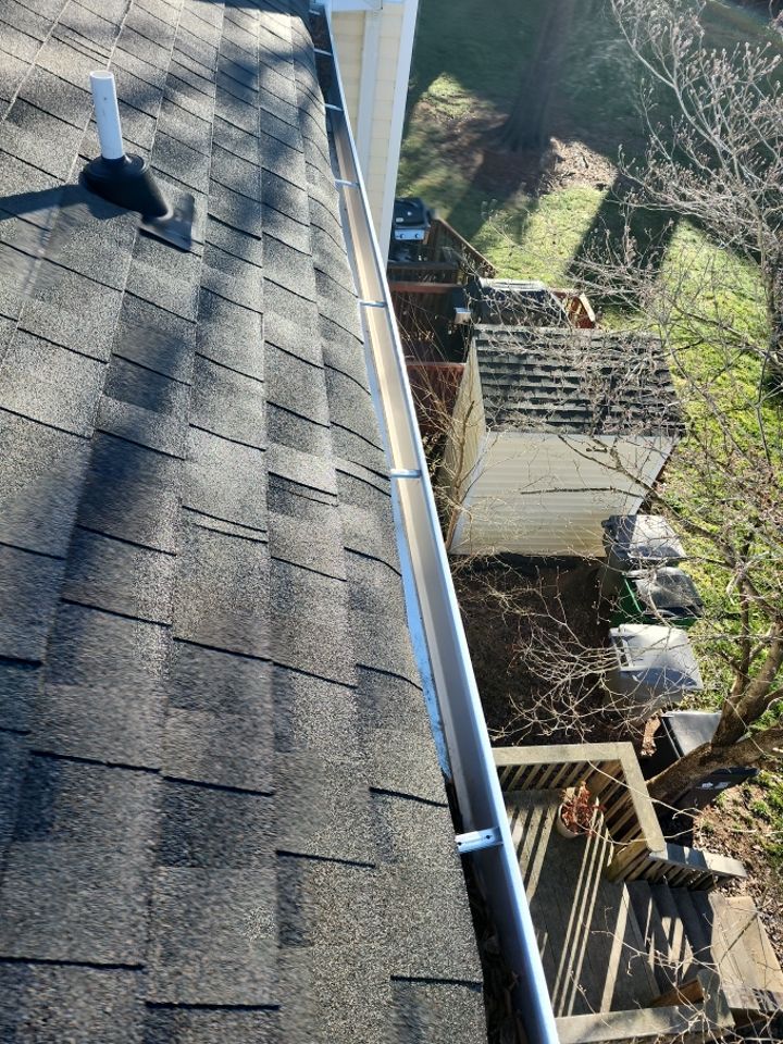 Gutter Cleaning using water by Power Wash Masters LLC