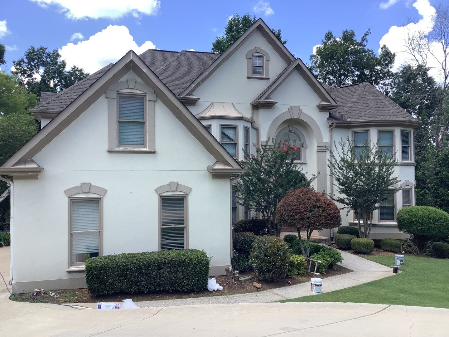 Stucco Exterior Painting and Deck Refinishing in Duluth by Swift Home Renovations