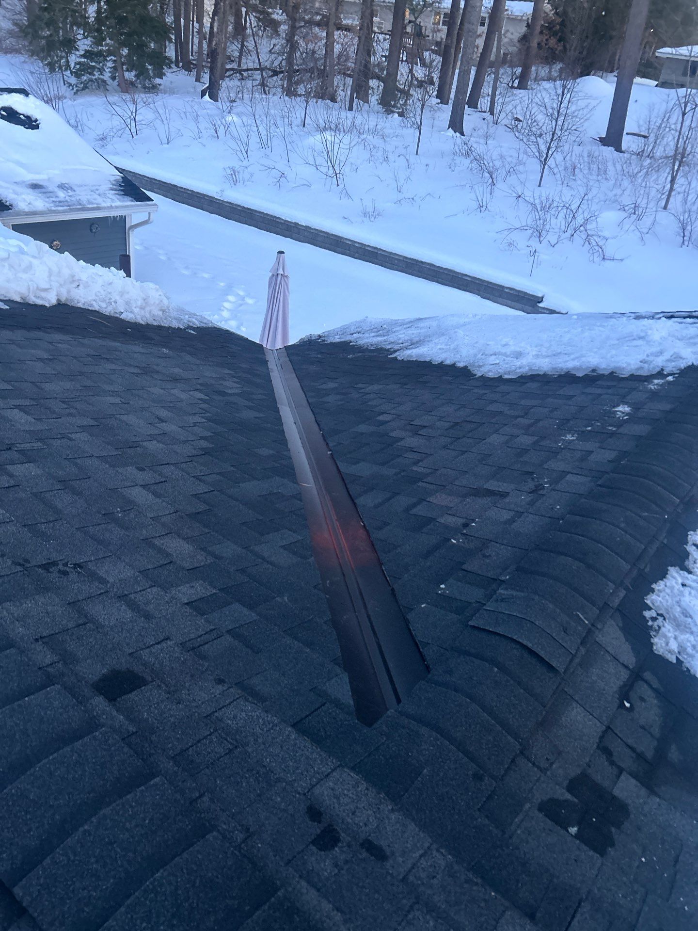 Ridge Cap Replacement & Black Metal Valley Installation in Chelmsford, MA by Mighty Dog Roofing of Greater Middlesex County