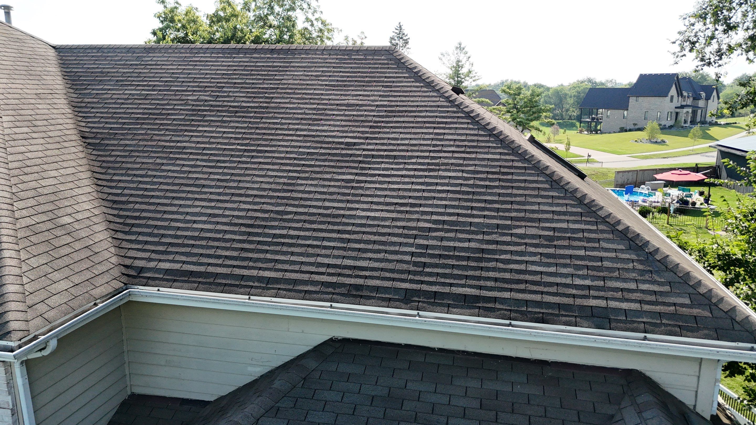 Roof and windows by Optimal Home Improvement 