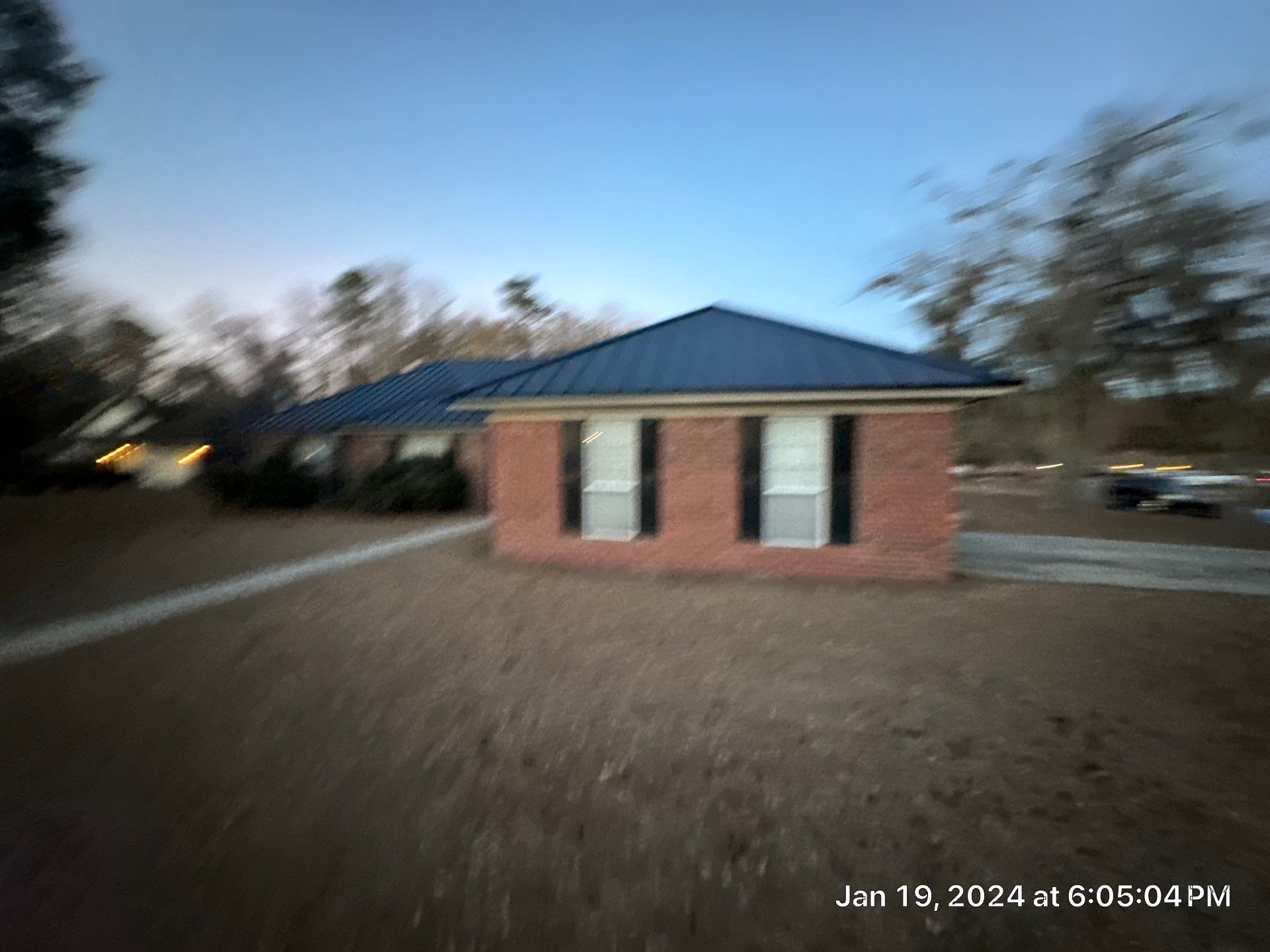 Residential Roofing Installation using Benton 26Ga 1inc Snapcock Metal Roof KYNAR Matte Black by Talya Roofing