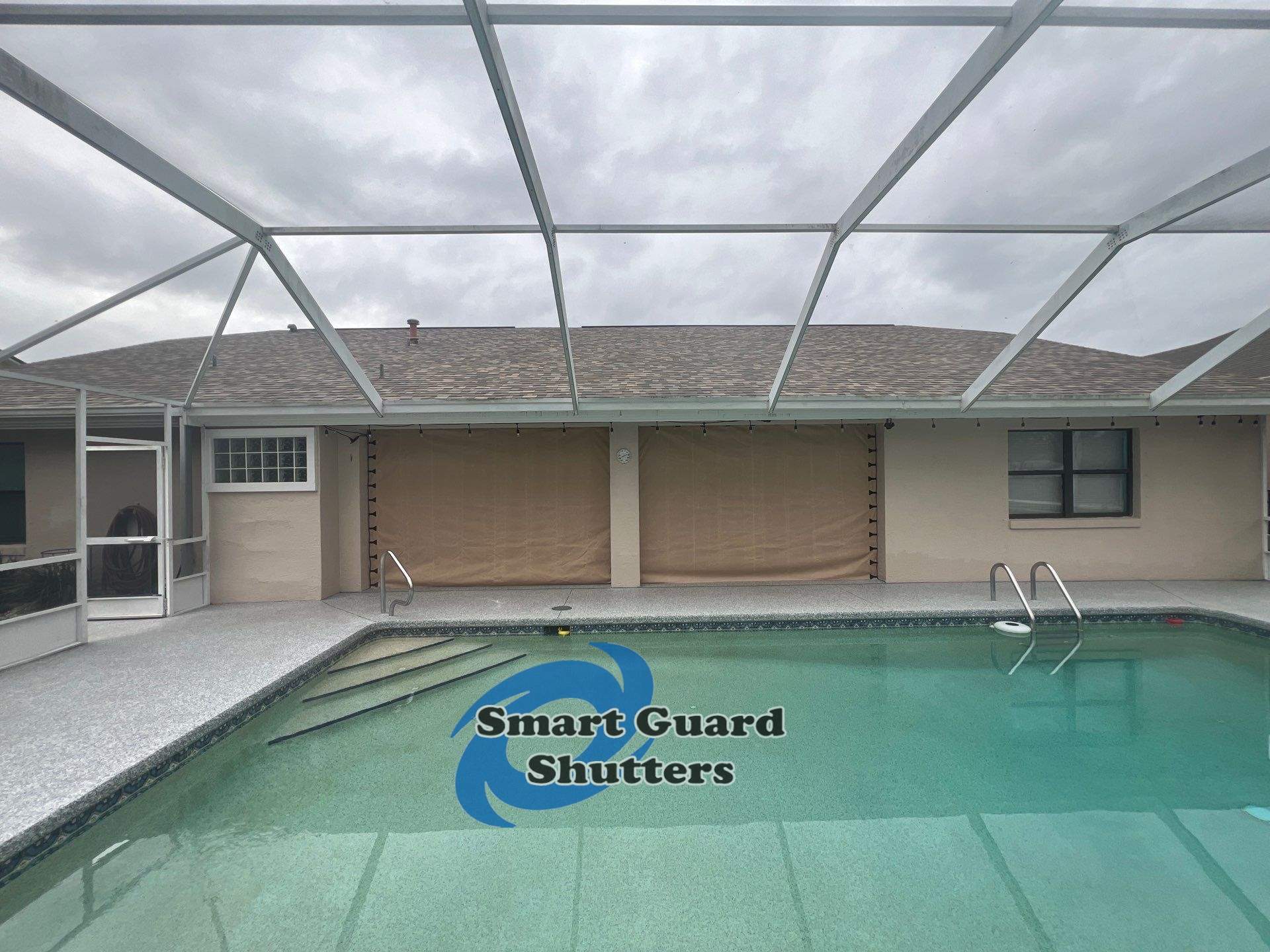 AstroGuard Hurricane Fabric in Tan by Smart Guard Shutters