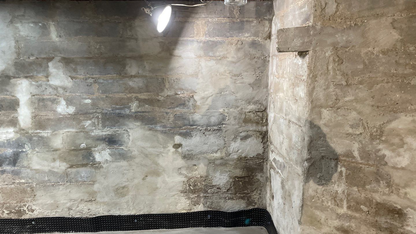 Interior Drain Tile & Foundation Crack Repair in Northeast Minneapolis by Waterproofing Northeast