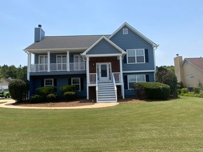 Comprehensive Exterior Painting for Cartersville Home with Blue Siding Transformation