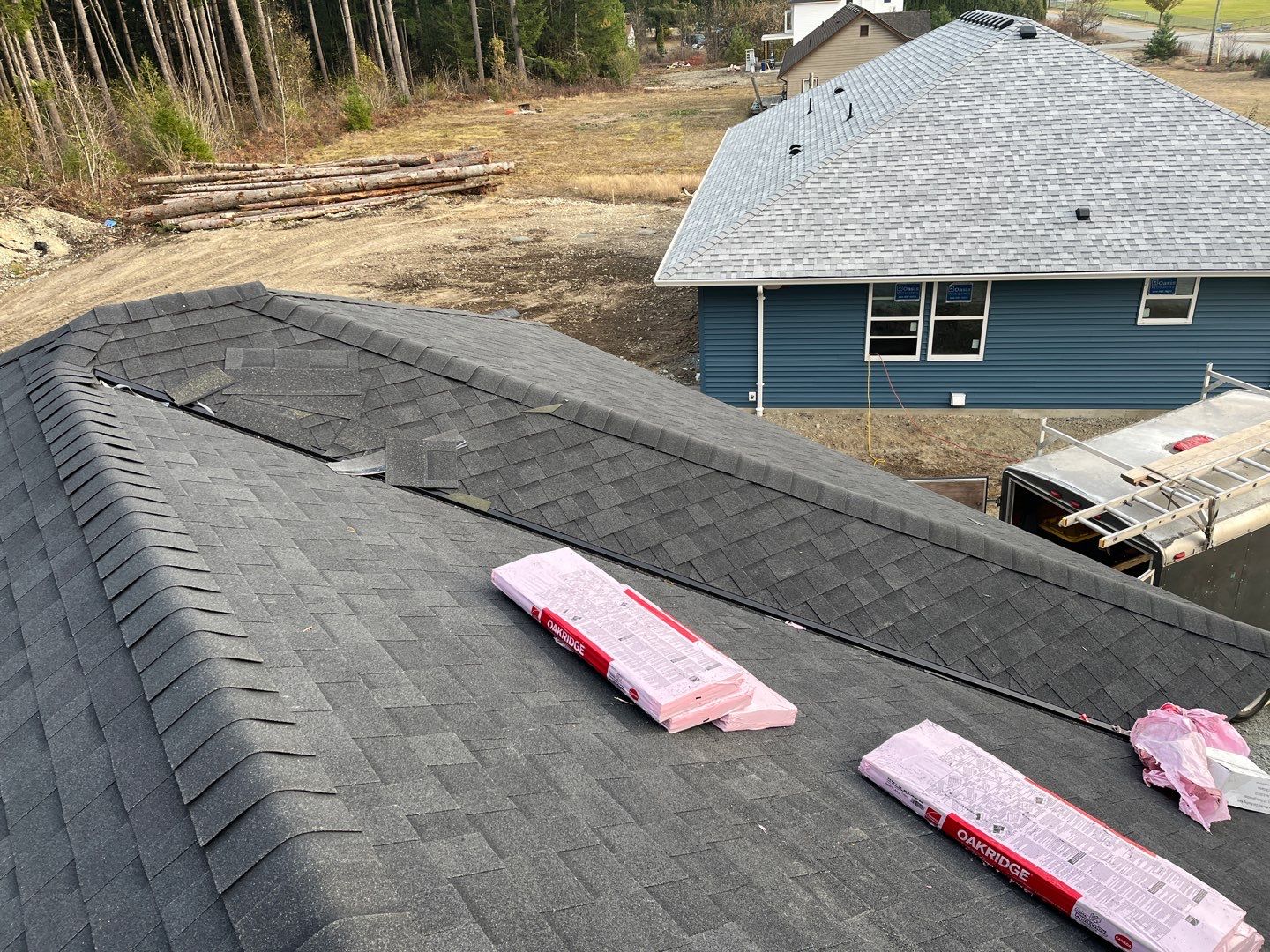 Residential Roofing Installation using OC Oakridge shingles by Top Notch Roofing Inc